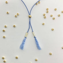 Load image into Gallery viewer, 'Aquarius' Zodiac Morse Code bead bracelet - detail of adjustable sliding bead