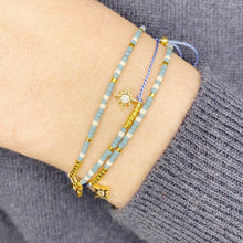 Load image into Gallery viewer, 'Aquarius' Zodiac Morse Code bead bracelet being worn