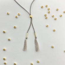 Load image into Gallery viewer, 'Capricorn' Zodiac Morse Code bead bracelet - detail of adjustable sliding bead