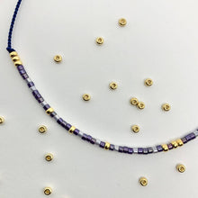 Load image into Gallery viewer, Close-up photo showing the detail of the beads on our 'Carpe Diem' Morse Code Bracelet