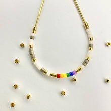 Load image into Gallery viewer, Close up photo of the beads on our 'Love Wins' Pride Morse Code Earrings