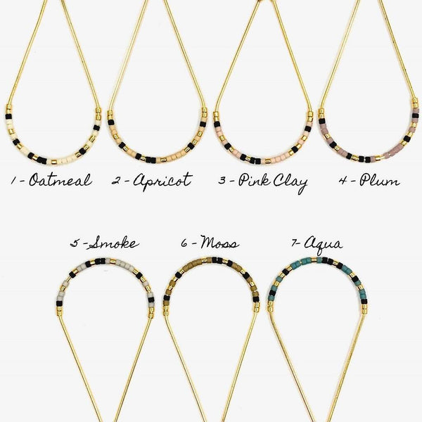 Close up photo of the beads on our Morse Code Earrings