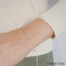 Load image into Gallery viewer, 'Daughter' Morse Code Bead Bracelet being worn on wrist