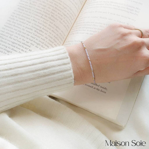 Close-up photo showing the detail of the adjustable sliding bead on our 'Grandma' Morse Code Bracelet