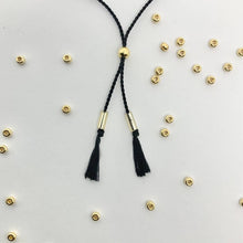 Load image into Gallery viewer, Close-up photo showing the detail of the adjustable sliding bead on our 'Happiness' Morse Code Bracelet