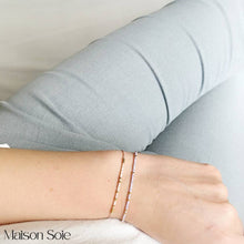 Load image into Gallery viewer, 'Happiness' Morse Code Bead Bracelet being worn