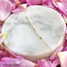 Load image into Gallery viewer, 'Je t'aime' Morse Code Bead Bracelet being displayed (French for I Love You)