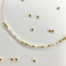 Load image into Gallery viewer, Close-up photo showing the detail of the beads on our 'Je t'aime' Morse Code Bracelet - French for 'I Love You'