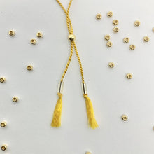 Load image into Gallery viewer, 'Leo' Zodiac Morse Code bead bracelet - close up detail of adjustable sliding bead
