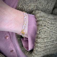 Load image into Gallery viewer, 'Libra' Zodiac Morse Code bead bracelet being worn