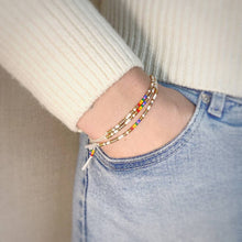 Load image into Gallery viewer, Collection of 3 'Love Wins' LGBTQ Pride Morse Code Rainbow Bead Bracelets being worn