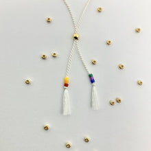Load image into Gallery viewer, 'Love Wins' LGBTQ Pride Morse Code bead bracelet - close up detail of adjustable sliding bead