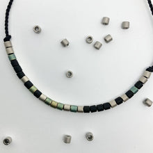 Load image into Gallery viewer, Close-up photo showing the detail of the beads on our 'Brother' Mens Morse Code Bracelet