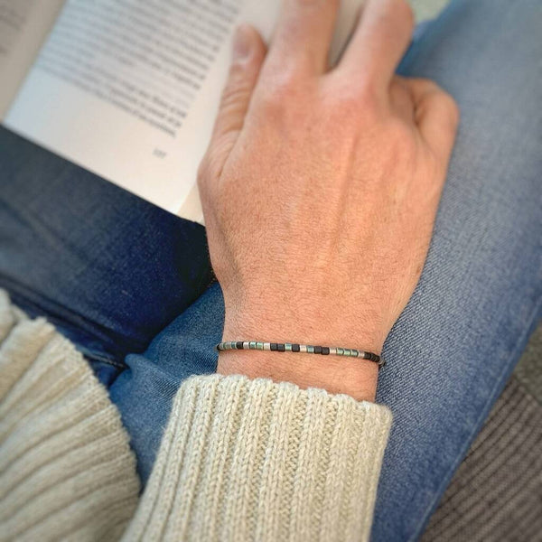 'Soulmate' Mens Morse Code bead bracelet - close up photo showing detail of the adjustable sliding bead
