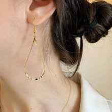 Load image into Gallery viewer, 'Mother' Morse Code Earrings being worn in the Oatmeal colour