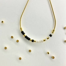 Load image into Gallery viewer, Close up photo of the beads on our Morse Code Earrings