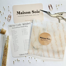 Load image into Gallery viewer, An example of the packaging and presentation for our 'Mother' Morse Code Earrings