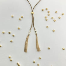 Load image into Gallery viewer, 'Sagittarius' Zodiac Morse Code bead bracelet - close up detail of adjustable sliding bead