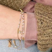 Load image into Gallery viewer, 'Sagittarius' Zodiac Morse Code bead bracelet being worn