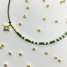Load image into Gallery viewer, 'Taurus' Zodiac Morse Code bead bracelet - detail of beads and pendant