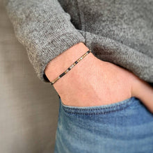 Load image into Gallery viewer, Mens Morse Code Bead Bracelet being worn - The beads are arranged to spell out 'Thank You'