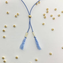 Load image into Gallery viewer, &#39;Aquarius&#39; Zodiac Morse Code bead bracelet - detail of adjustable sliding bead
