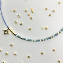 Load image into Gallery viewer, &#39;Aquarius&#39; Zodiac Morse Code bead bracelet - detail of beads and pendant
