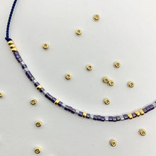 Load image into Gallery viewer, Close up detail of the beads used on BFF Morse Code Bracelet - colour displayed here is Blueberry.
