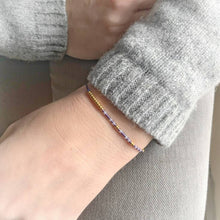 Load image into Gallery viewer, BFF Morse Code Bead Bracelet being worn on wrist - the colour displayed here is Blueberry.
