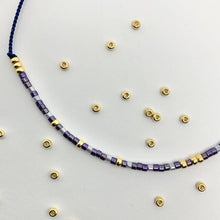 Load image into Gallery viewer, Close-up photo showing the detail of the beads on our &#39;Carpe Diem&#39; Morse Code Bracelet
