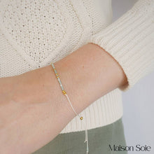 Load image into Gallery viewer, &#39;Daughter&#39; Morse Code Bead Bracelet being worn on wrist
