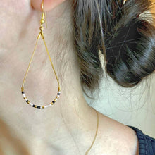 Load image into Gallery viewer, &#39;Daughter&#39; Morse Code Earrings being worn in the Pink Clay colour
