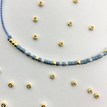 Load image into Gallery viewer, Close-up photo showing the detail of the beads on our &#39;Forever&#39; Morse Code Bracelet
