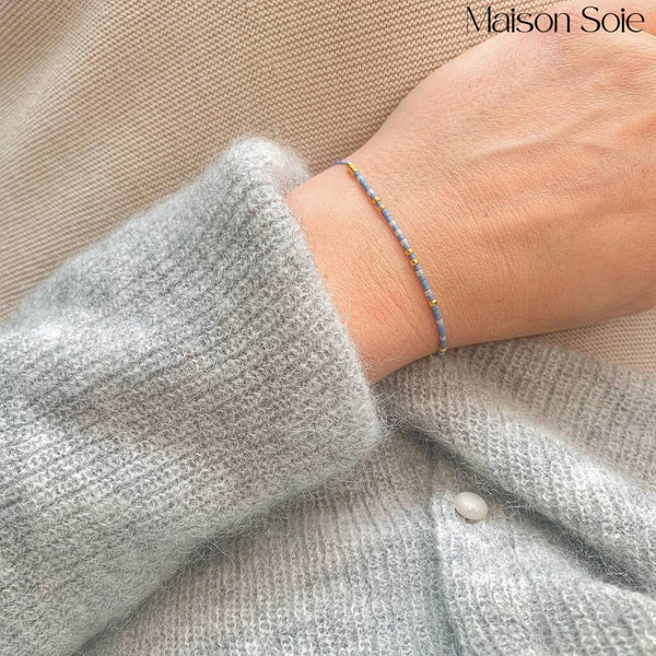 Close-up photo showing the detail of the adjustable sliding bead on our 'Forever' Morse Code Bracelet