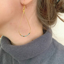 Load image into Gallery viewer, Morse Code Earrings being worn - the colour displayed in this photo is Aqua Blue
