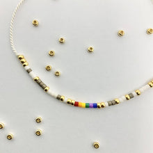 Load image into Gallery viewer, &#39;Love Wins&#39; LGBTQ Pride Morse Code bead bracelet - close up detail of beads
