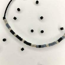 Load image into Gallery viewer, Close-up photo showing the detail of the beads on our &#39;Miss You&#39; Mens Morse Code Bracelet
