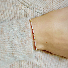 Load image into Gallery viewer, &#39;Sister&#39; Morse Code Bracelet in &#39;Rose&#39; Colour being worn

