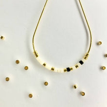 Load image into Gallery viewer, Close up photo of the beads on our Morse Code Earrings
