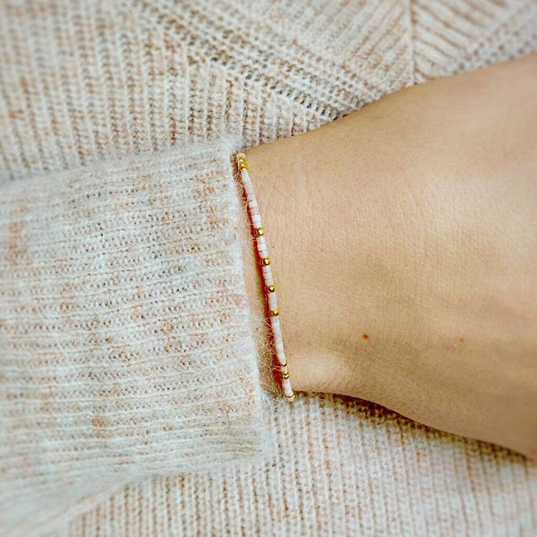 Close-up photo showing the detail of the adjustable sliding bead on our 'Thank You' Morse Code Bracelet