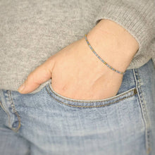 Load image into Gallery viewer, &#39;Thinking Of You&#39; Morse Code Bead Bracelet being worn on wrist
