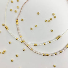 Load image into Gallery viewer, Close-up photo showing the detail of the beads on our &#39;Valentine&#39; Morse Code Bracelet
